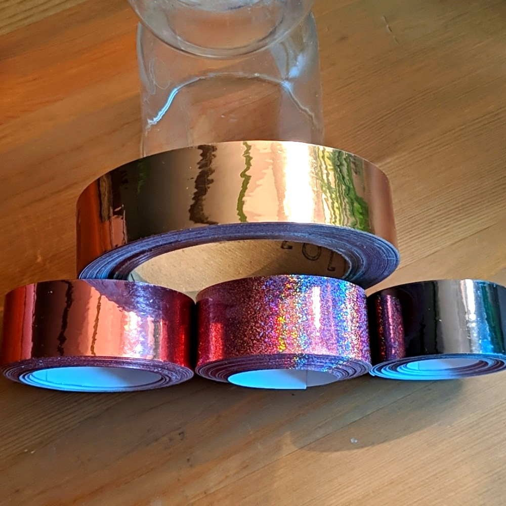 Metallic tapes for hula hoops